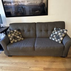 Dark Grey Couch w/ 2 pillows