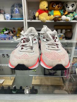 Size 6.5. Grey/Salmon Women’s Nike Quest 6 Running Shoes
