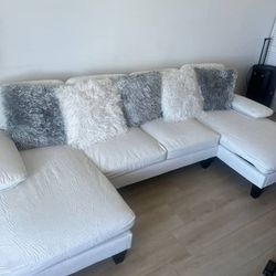 Brand new U-shaped sectional sofa. Beige. $100 maximum down payment. 