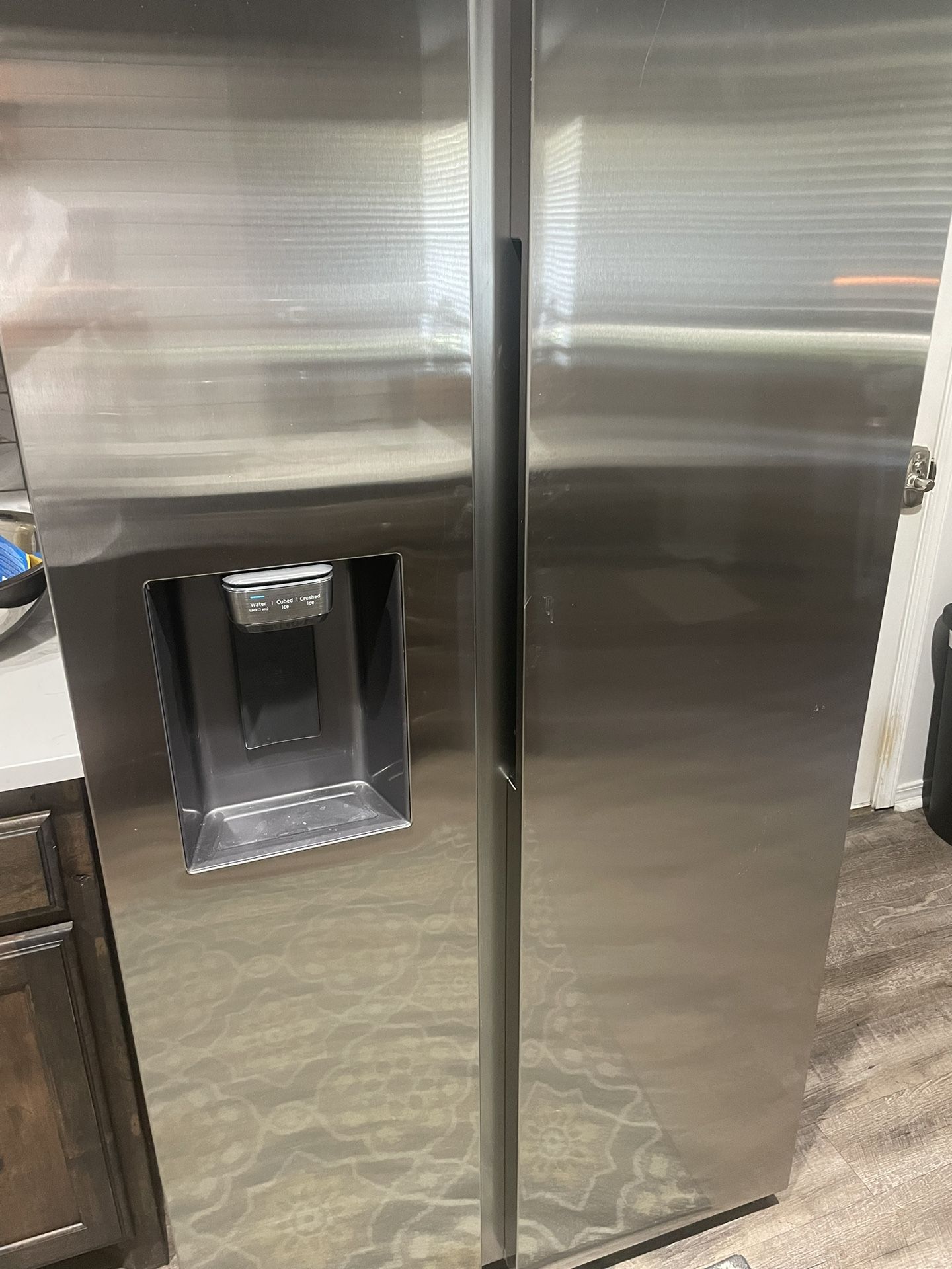 2 Month Old Stainless Samsung Side by Side Refrigerator. In brand new condition.