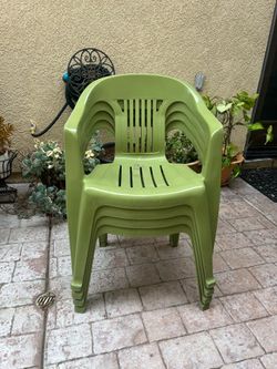4 green chairs
