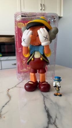 Pinocho and jimmy cricket kaws