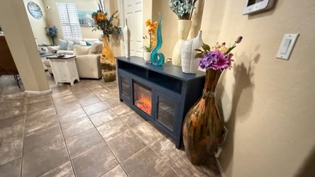 Beautiful blue fireplace /tv stand in excellent condition 59” inches long