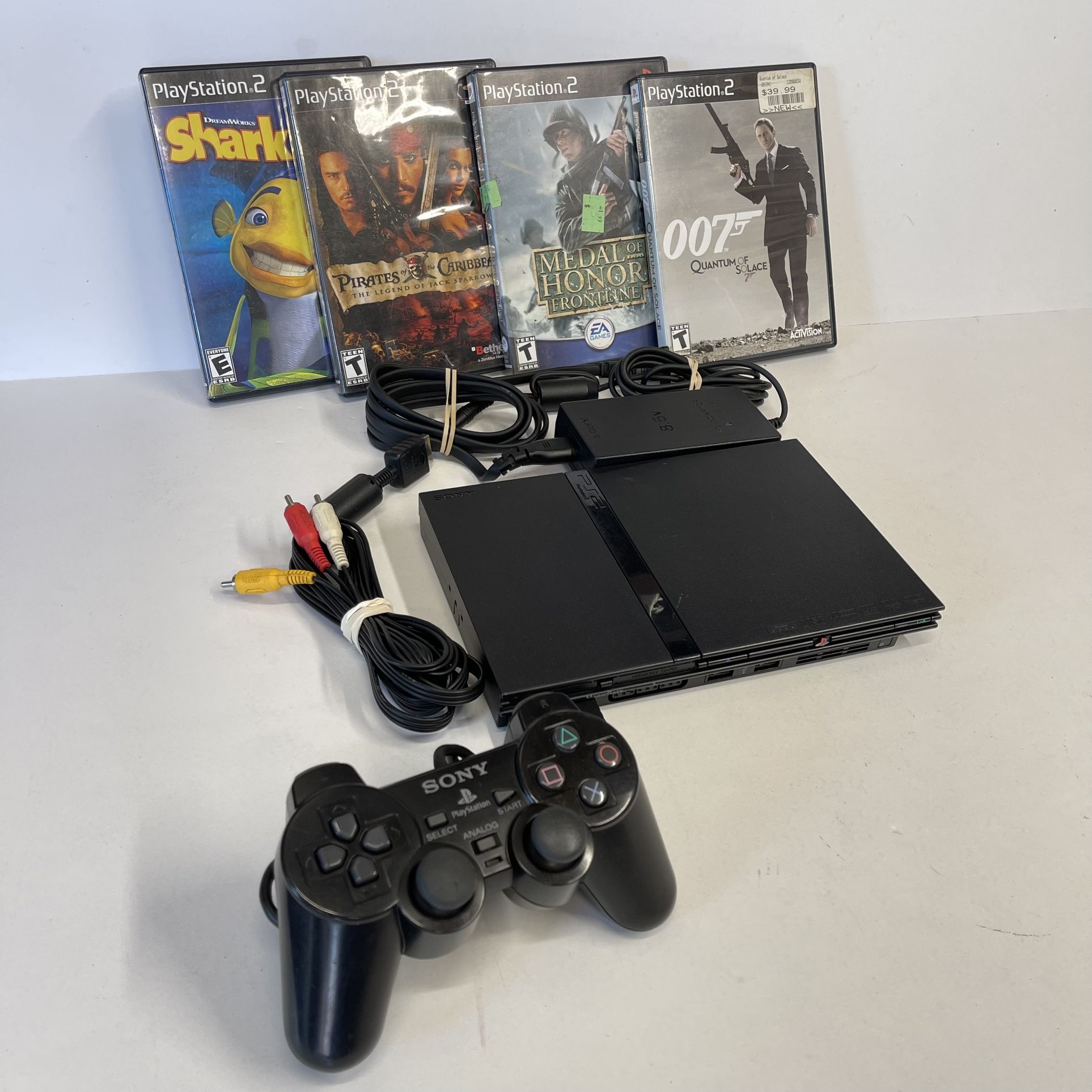 PlayStation 2 Slim With 4 Games