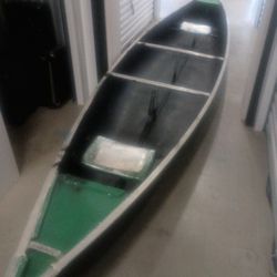 2 Person Canoe About 36 Ft. Long. Waterproof ,Caulking Around Trim Edges. Fishing Pole Stands,Both Sides. With Car Carrier  Pads / Straps.