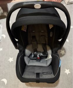 Graco SnugRide Lite LX infant car seat with base