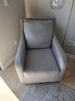 Grey swivel chair