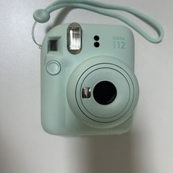INSTAX MINI 12 MINT GREEN, INSTAX MINI 12 CLAY WHITE ($50each or $90 for both) like new, bestbuy certified. Come as shown. Fully functional