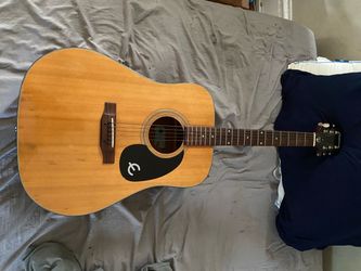 This is a Epiphone acoustic guitar