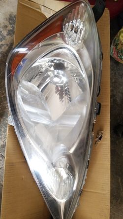 Honda fit headlight pasager side