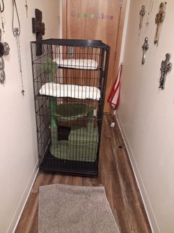 Catio with cactus cat scratcher and plush levels for cat relaxtion