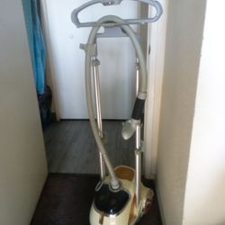 Steamer For A Wrinkle Free Clothes And Strong
