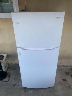 Refrigerator - Works good, barley used.