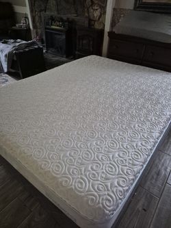 Nice queen Tempurpedic mattress with free box spring
