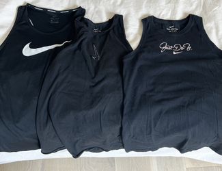 3 Nike Tanks