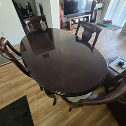 Wood Table And 6 Chairs.