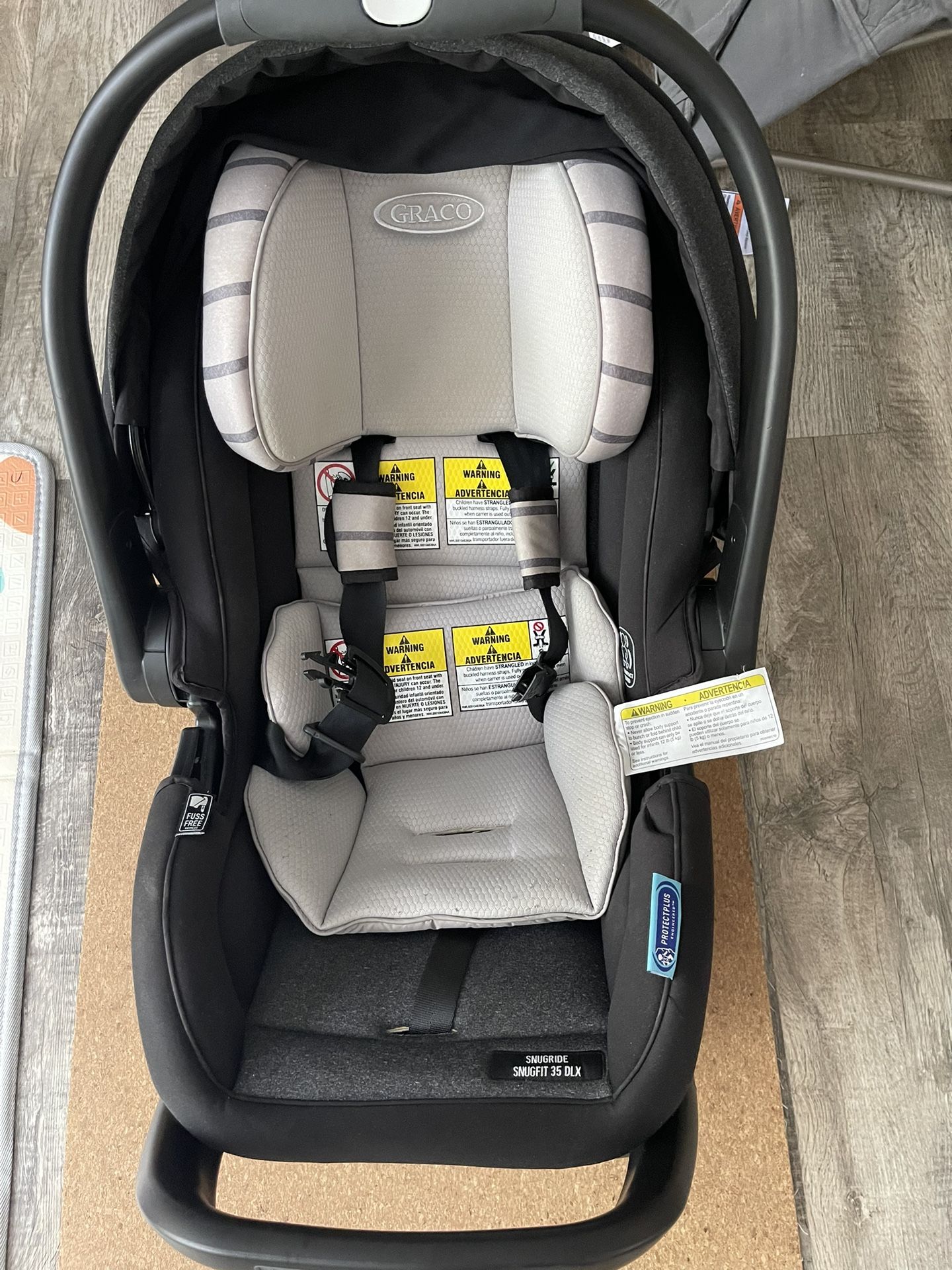 Graco SnugRide SnugFit 35 DLX Infant Car Seat, Maison With The Base
