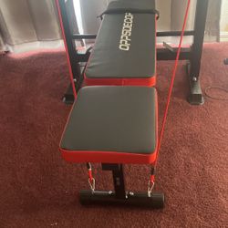 Bench Press Set With Brand New Chrome Bar, 2 35 Pound Weights, 2 25 Pound Weights, & 2 10 Pound Weights