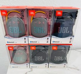 New JBL Clip 4 portable speakers come in original packaging. Each unit has a built-in carabiner for easy attachment. These speakers are waterproof and