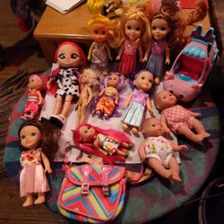 Different Size Dolls And A Couple Accessories