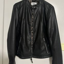 Brand new, never worn, DKNY black leather biker jacket with leopard print lining.