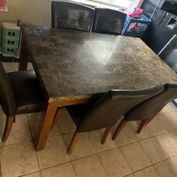 Granite table and six chairs