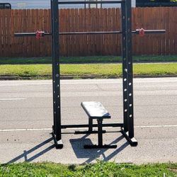 Heavy duty olympic squat power rack cage pullup and olympic Price firm.
Good condition.

Incredibly strong and sturdy.

Includes heavy duty Bar bench!