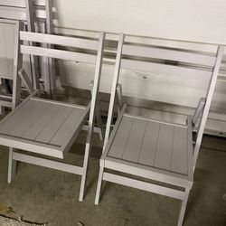 4 Folding Chairs 