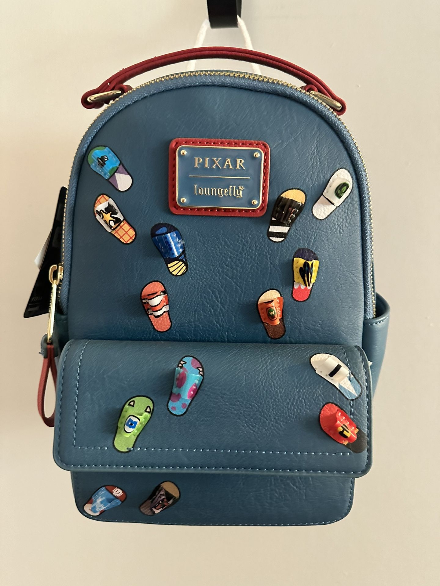 Lounge fly Disney Pixar Slides Mini Backpack Loungefly The Incredibles Syndrome Glow Mini Backpack  main image 2