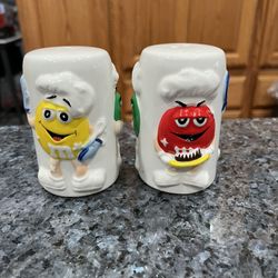 White M & M’s With Red, Green And Yellow Pair Of Salt And Pepper Shakers.  Brand New Never Used 