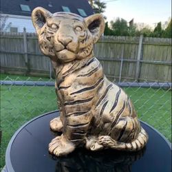 Golden tiger, cub statue