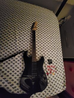 Squier Electric Guitar and Amplifier