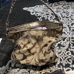 Coach purse, wallet and makeup case 