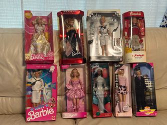9  vintage Barbie dolls , new in the box