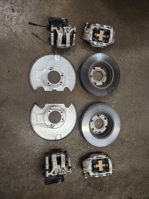 GMC front and rear brake pads, calipers, and rotors