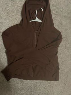 brown zip up sweater