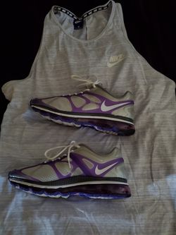 Nike Air Max, worn a hand full of time. Size Mens 9.5 or woman's 11.

Comes with Nike matching Nike Tank Size large They are being sold together. Tank
