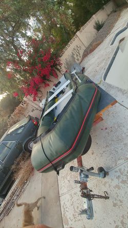 Inflatable boat with custom trailer