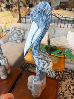 New large handcrafted carved pelican on triple post