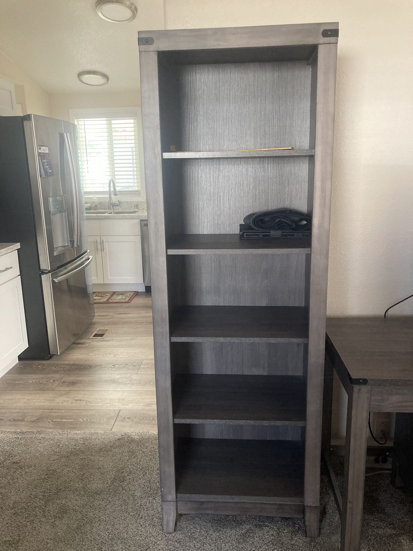 2 Cases With Bookshelves  Sold Separately Or Together. Together Selling For $170 Or Selling Separately Asking $95. 00, They are  Gray Wood  Color.
