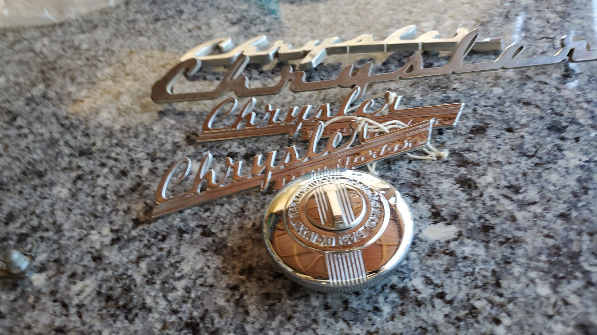 1950 Chrysler badges emblems gas cap