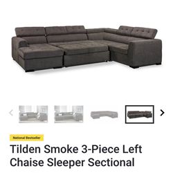 Dark grey sleeper couch 