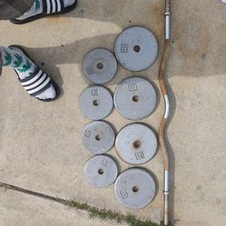 Curl bar and 60 pounds of weights