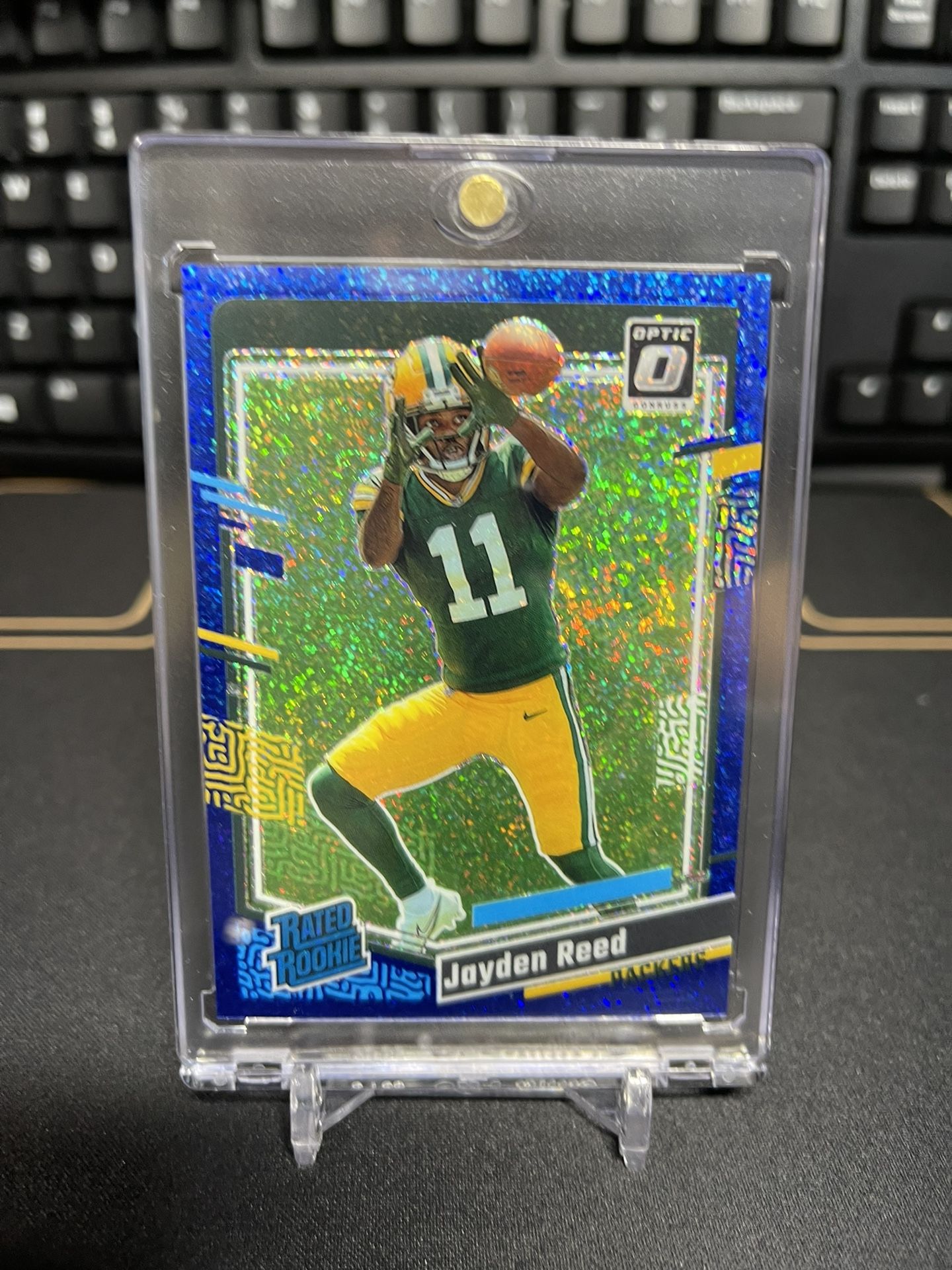 2023 Panini - Donruss Optic Football Rated Rookie Jayden Reed No. 239 Blue Glitter
