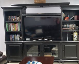 Large, dark brown entertainment center