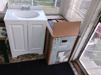 Brand new sink toilet new vanity.  130