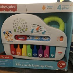 Fisher price laugh and learn silly best sale sounds light up piano