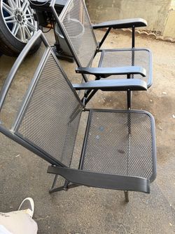 Two metal screen type chairs