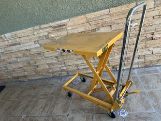 Hydraulic lift table 100% good working condition to lift heavy items 30 inches high