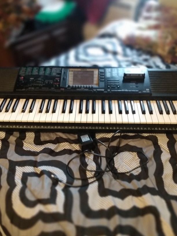 Yamaha keyboard with stand